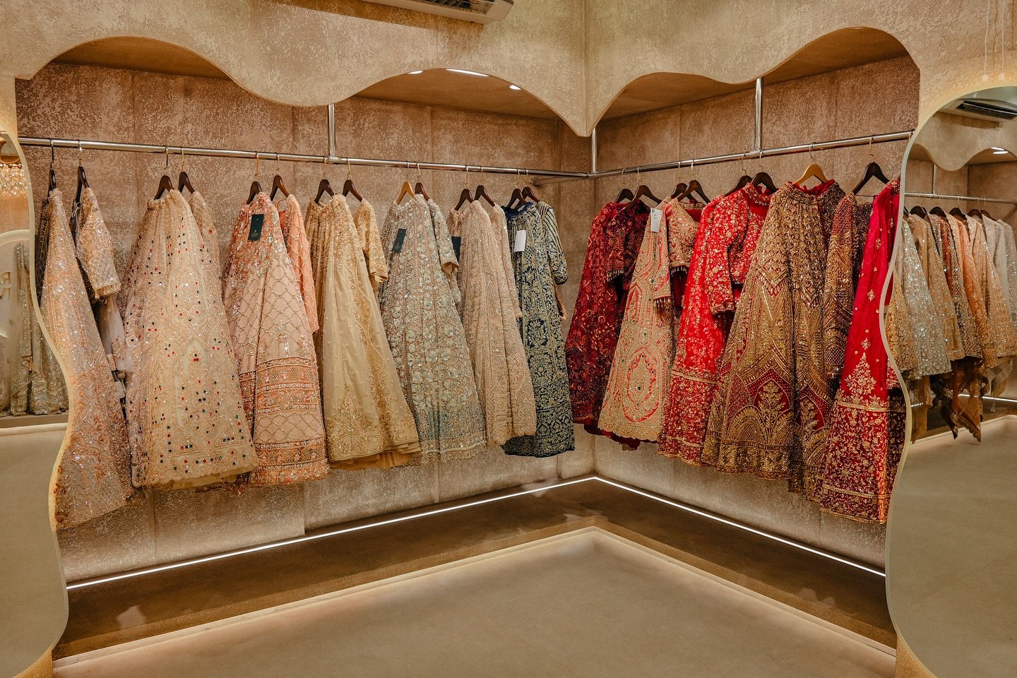 Wide view of the Snehalayaa Silks showroom floor with multiple collections